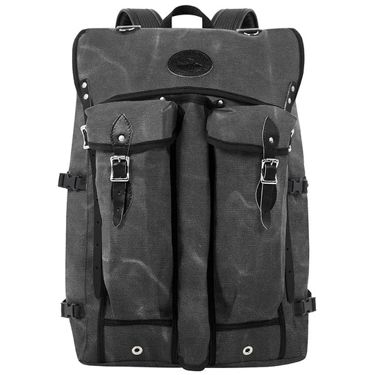 Bushcrafter outdoor backpack in rugged gray waxed canvas with leather straps, designed for durable outdoor use and crafted for dependable performance.
