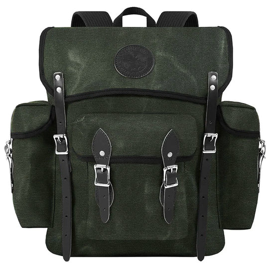 Wanderer backpack in Olive Drab with handmade canvas and leather straps, designed for rugged outdoor use and durable performance by Duluth Pack.