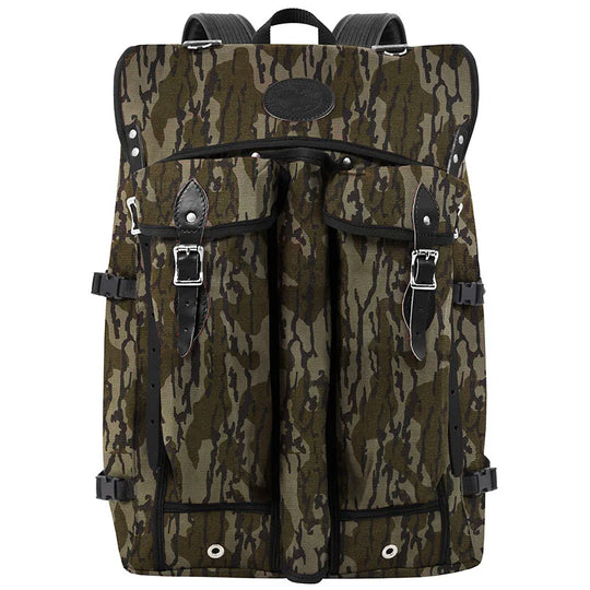 Bushcrafter rugged 15-ounce canvas backpack in camo pattern designed by Duluth Pack for durable outdoor use and bushcraft adventures.