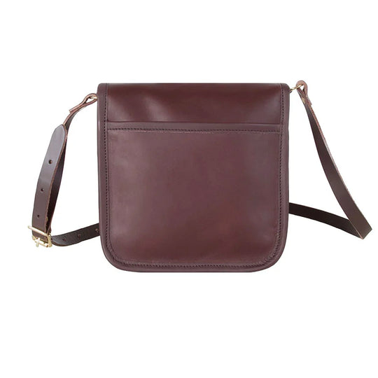 Leather Mini Haversack in premium American cowhide leather with adjustable strap, designed by Duluth Pack for rugged outdoor use and lasting durability.