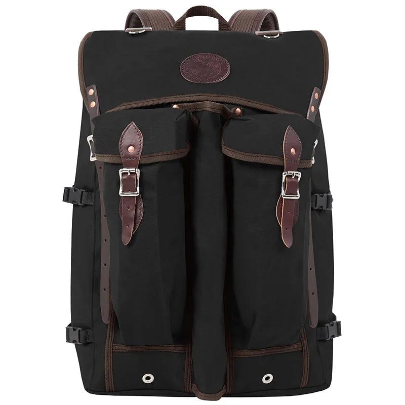 Bushcrafter black rugged canvas and leather backpack by Duluth Pack designed for durable outdoor use and bushcraft adventures.