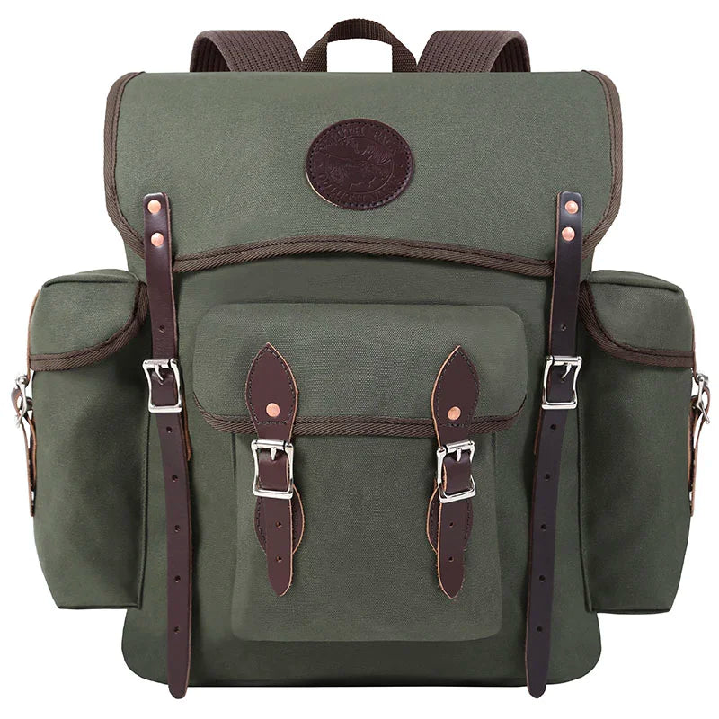 Wanderer backpack in Olive Drab featuring rugged canvas and hand-cut leather straps, designed for durable outdoor adventures and hiking by Duluth Pack.