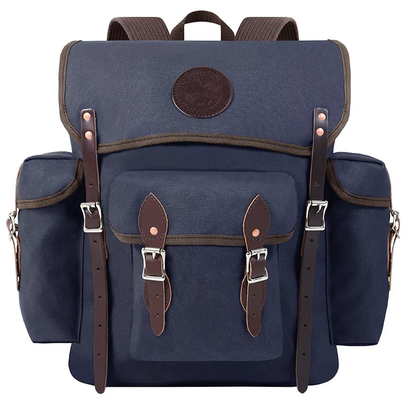 Wanderer backpack in navy made with rugged canvas and hand-cut leather straps, designed for durable outdoor use and adventurous day hikes.