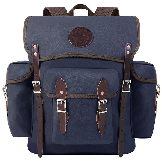 Wanderer backpack in navy made with rugged canvas and hand-cut leather straps, designed for durable outdoor use and adventurous day hikes.