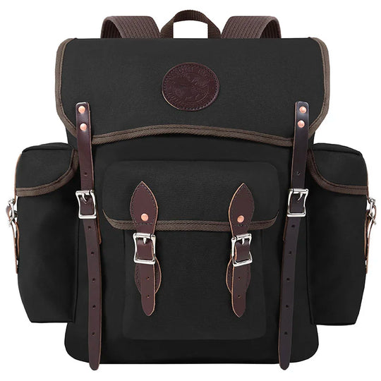 Wanderer rugged backpack in black canvas with hand-cut leather straps and reinforced buckles, designed for durable outdoor use and adventure ready performance.