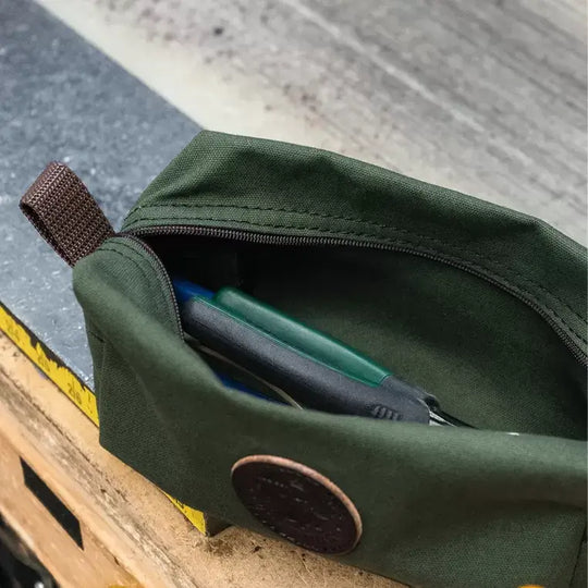 NEW Grab-N-Go Bag In Olive Drab Green Open With A Tool Inside On A Work Bench