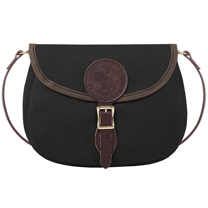Medium Shell Purse in black canvas with antique brass hardware and leather accents, crafted by Duluth Pack for durable outdoor use with heritage quality.