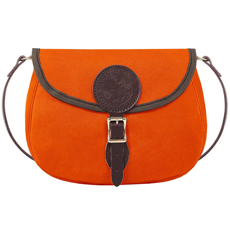 Medium Shell Purse in vibrant orange with antique brass hardware, crafted from durable canvas and leather by Duluth Pack, perfect for rugged outdoor use.