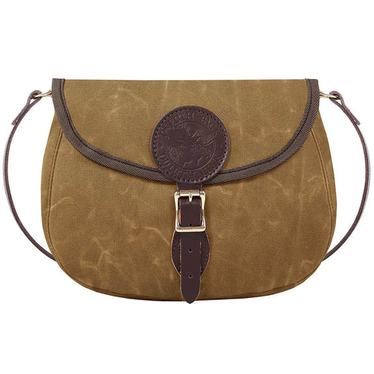 Medium Shell Purse in waxed khaki canvas with leather trim and antique brass hardware, showcasing durable handmade craftsmanship by Duluth Pack for rugged outdoor use.