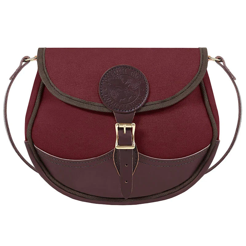 Deluxe Medium Shell Purse in burgundy with premium leather accents and adjustable strap, showcasing handcrafted durability for outdoor use by Duluth Pack.