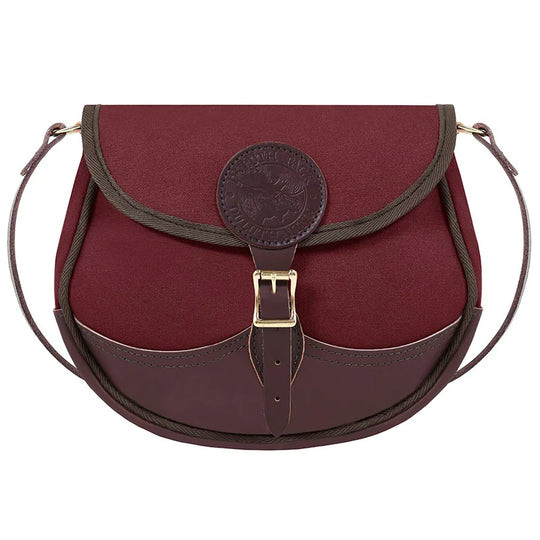Deluxe Medium Shell Purse in burgundy with premium leather accents and adjustable strap, showcasing handcrafted durability for outdoor use by Duluth Pack.