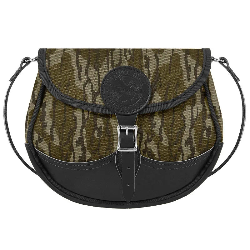 Deluxe Medium Shell Purse in Mossy Oak Bottomland Camo with premium leather accents, showcasing rugged outdoor style and craftsmanship by Duluth Pack.