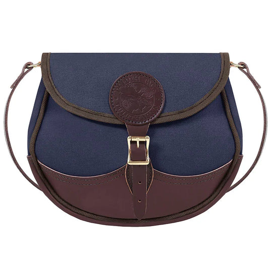 Deluxe Medium Shell Purse in navy with premium leather trim and adjustable strap, showcasing durable craftsmanship by Duluth Pack for rugged outdoor use.