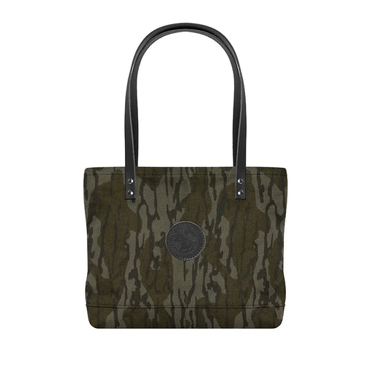 Lakewalk Tote in Mossy Oak Bottomland Camo with riveted handles and durable canvas, perfect for rugged outdoor use and everyday carrying.