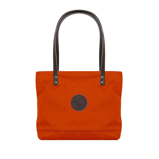 Lakewalk Tote in orange with riveted leather handles and rugged canvas, showcasing durable outdoor craftsmanship by Duluth Pack for versatile day to night use.