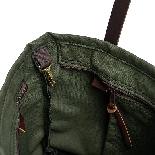 Lakewalk Tote in Olive Drab featuring durable canvas interior with zippered pocket and key clip, designed for rugged outdoor use by Duluth Pack.