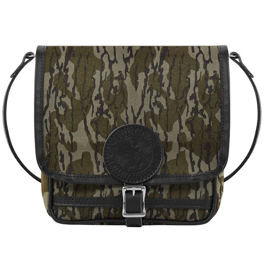 Mini Haversack Purse in Mossy Oak Bottomland Camo canvas with leather trim, designed for rugged outdoor use and durable everyday travel gear.