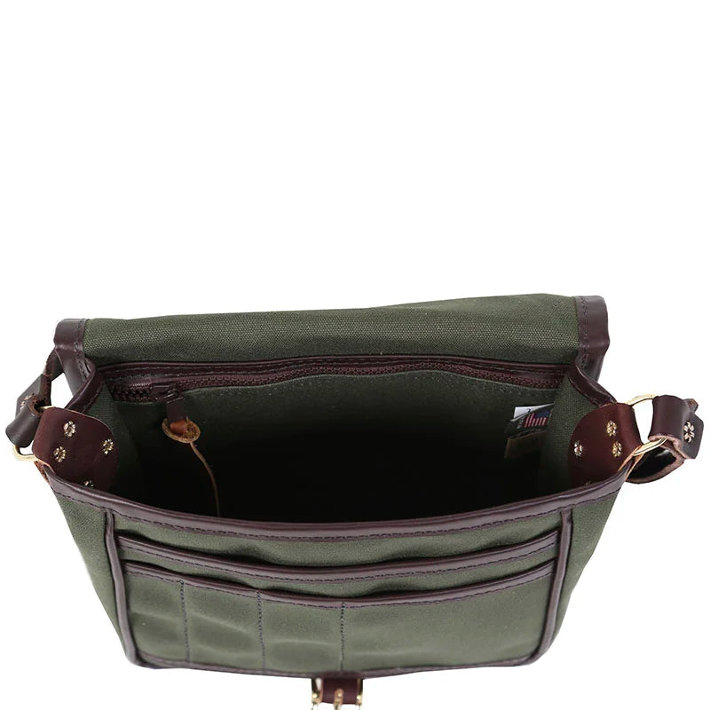Mini Haversack Purse in Olive Drab rugged canvas with premium leather trim and brass hardware, open to show spacious interior for everyday use and travel.