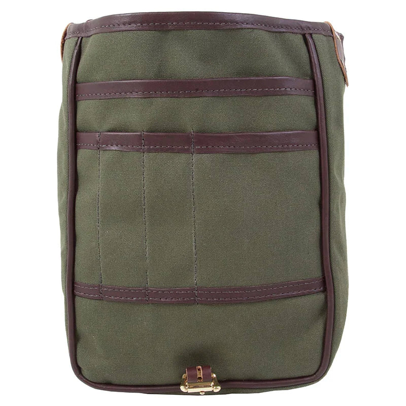 Haversack in rugged 15-ounce canvas with premium leather trim and antique brass hardware, designed for durable outdoor use by Duluth Pack.