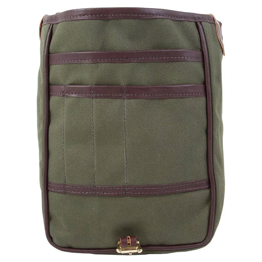 Haversack in rugged 15-ounce canvas with premium leather trim and antique brass hardware, designed for durable outdoor use by Duluth Pack.