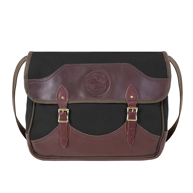 Deluxe Book Bag in black and burgundy with rugged canvas and handcrafted leather trim, designed by Duluth Pack for durable outdoor use and classic heritage style.