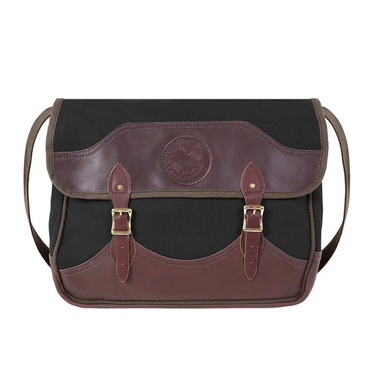 Deluxe Book Bag in black and burgundy with rugged canvas and handcrafted leather trim, designed by Duluth Pack for durable outdoor use and classic heritage style.
