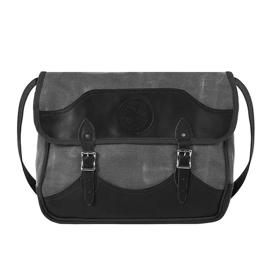 Deluxe Book Bag in waxed grey with black leather trim, handcrafted canvas and leather construction, designed for rugged outdoor use by Duluth Pack.