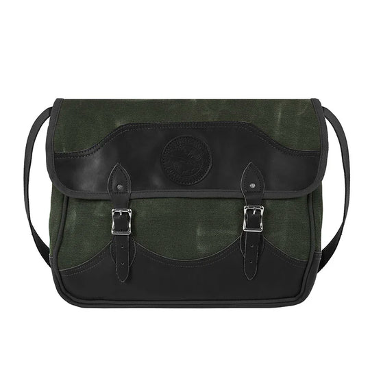 Deluxe Book Bag in olive drab with handcrafted leather bottom and flap trim, sturdy canvas construction, and comfortable cotton web shoulder strap for rugged outdoor use.