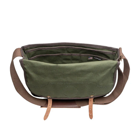 Deluxe Book Bag in Olive Drab featuring rugged 15-ounce canvas and handcrafted leather trim, designed by Duluth Pack for durable outdoor use and timeless style.