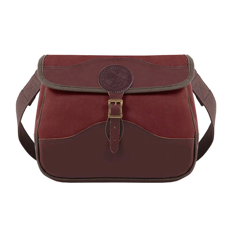 Field Satchel in rich burgundy canvas and leather with antique brass hardware, showcasing durable craftsmanship ideal for outdoor use by Duluth Pack.
