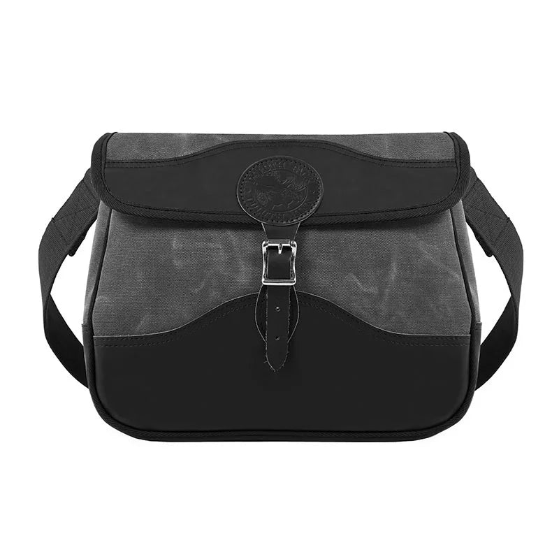 Field Satchel in rugged gray 15-ounce canvas with thick leather bottom and flap, designed by Duluth Pack for durable outdoor use and comfortable carrying.