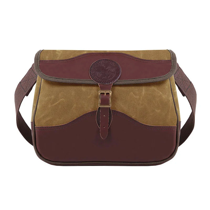 Field Satchel in rugged waxed canvas and premium leather with antique brass hardware, designed by Duluth Pack for durable outdoor use and heritage craftsmanship.