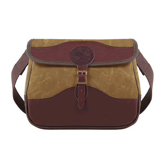 Field Satchel in rugged waxed canvas and premium leather with antique brass hardware, designed by Duluth Pack for durable outdoor use and heritage craftsmanship.