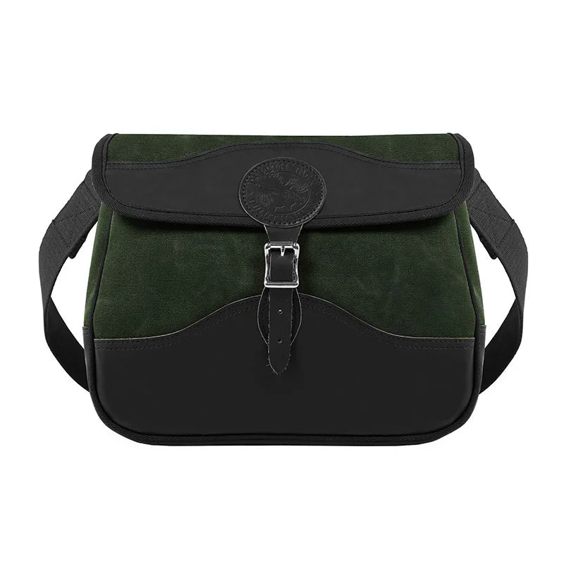 Field Satchel in rugged green canvas with black leather trim and durable strap, designed for outdoor use by Duluth Pack’s trusted craftsmanship.