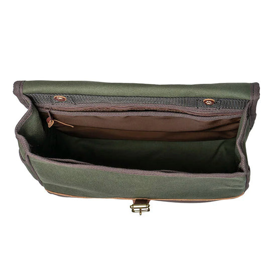 Field Satchel with rugged 15-ounce canvas and thick premium leather, open to show spacious interior and secure antique brass hardware, designed for outdoor use.