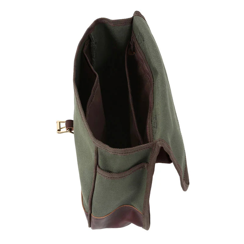 Field Satchel in rugged 15-ounce canvas with antique brass hardware and premium leather accents, designed for durable outdoor use by Duluth Pack.