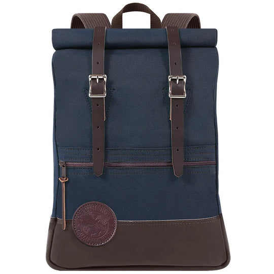 Deluxe Roll-Top Scout Pack in navy with leather accents, handcrafted by Duluth Pack, designed for rugged outdoor use and durable, long-lasting performance.