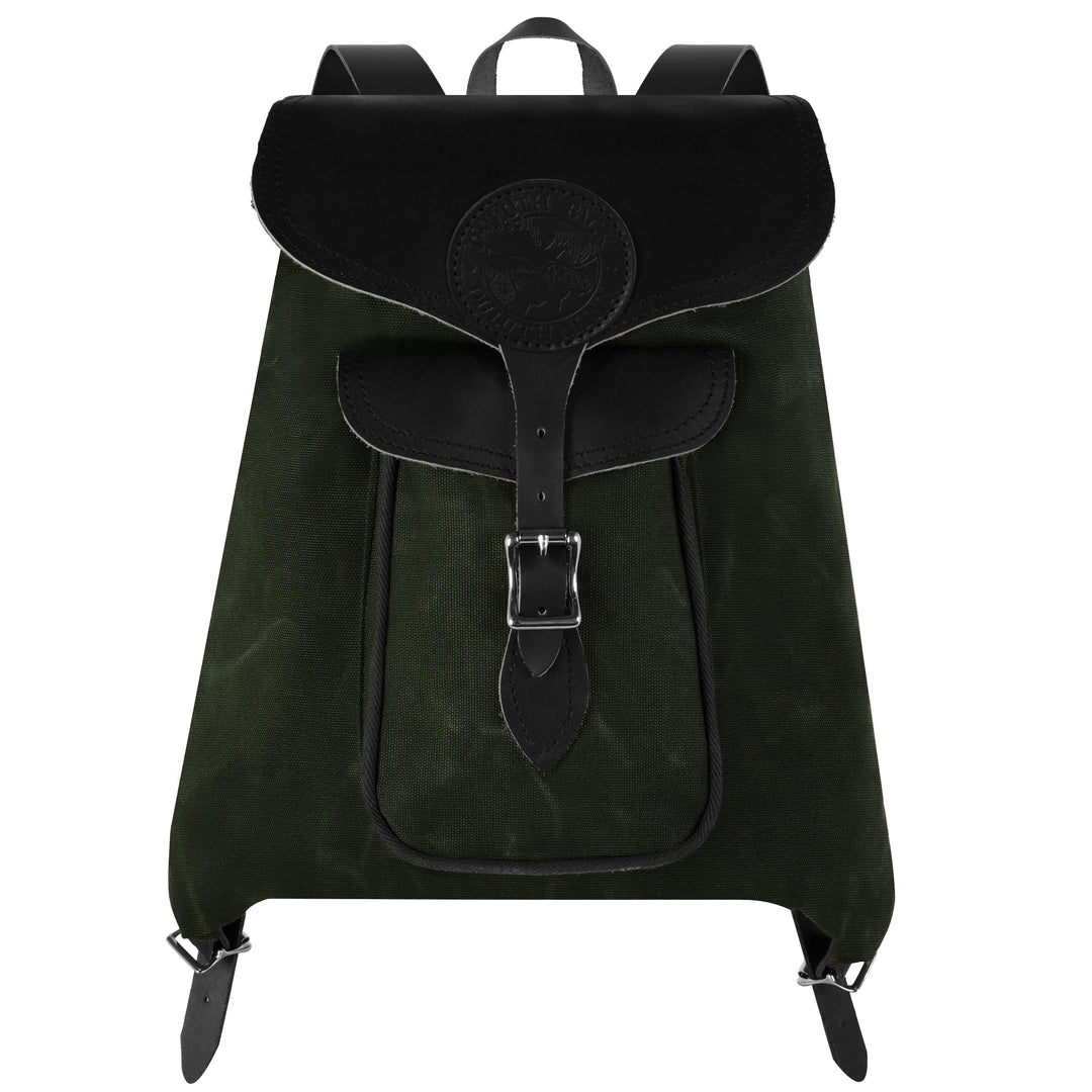 Rucksack Backpack in rugged waxed olive canvas with black leather straps and buckles, designed by Duluth Pack for durable outdoor and everyday use.