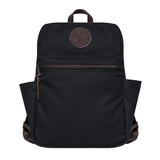 NEW Standard Backpack in black canvas with leather accents, featuring side pockets and front zippered compartment, designed for durable outdoor use by Duluth Pack.