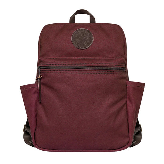 NEW Standard Backpack in burgundy with side pockets and front zip pocket, handmade canvas and leather by Duluth Pack for durable outdoor use.