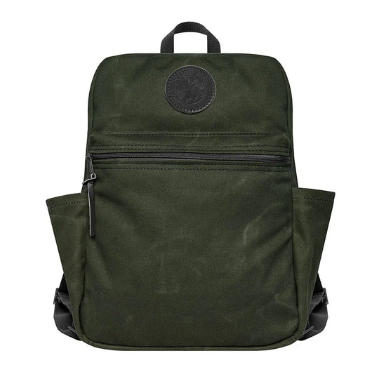 NEW Standard Backpack in Olive Drab by Duluth Pack, handmade waxed canvas with side pockets, designed for durable outdoor and school use.