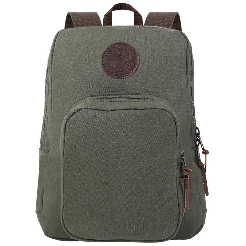 Large Standard Backpack in Olive Drab by Duluth Pack, crafted from durable canvas with leather accents, ideal for rugged outdoor adventures and everyday use.