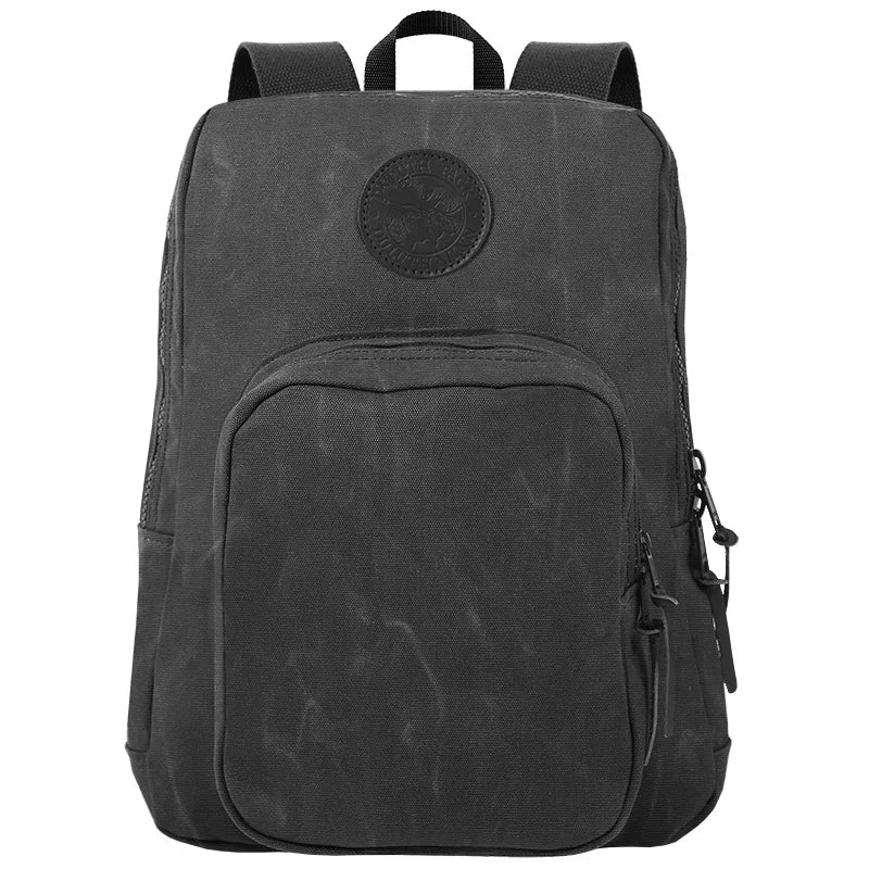 Large Standard Backpack in waxed grey canvas with durable construction and antique brass hardware, designed for rugged outdoor use and long-lasting performance.