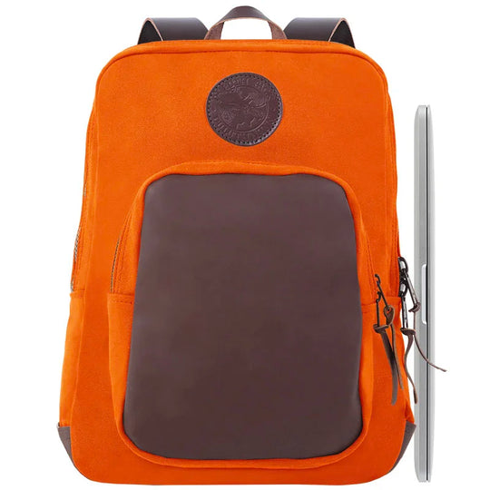 Deluxe Laptop Backpack in bright orange with brown leather front pocket, showcasing rugged craftsmanship by Duluth Pack for durable everyday outdoor use.