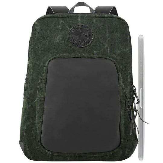Deluxe Laptop Backpack in olive drab waxed canvas with rugged leather front pocket, designed for durable outdoor use by Duluth Pack.
