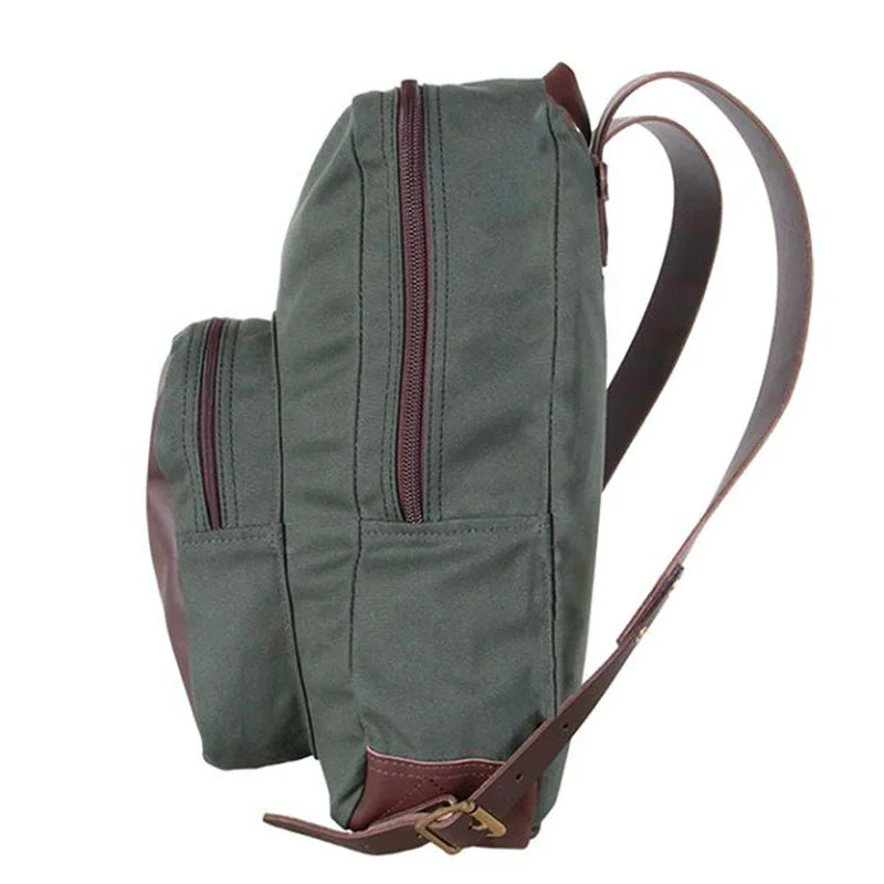 Deluxe Laptop Backpack in Olive Drab with rugged canvas and leather straps, featuring durable YKK zippers and handmade craftsmanship by Duluth Pack for outdoor use.