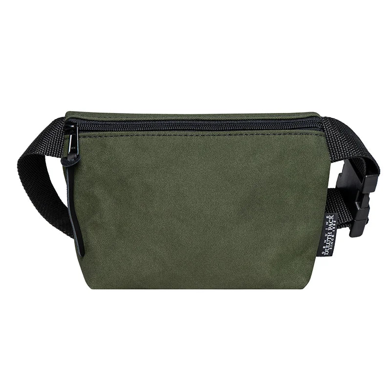 Mini Belt Bag in Olive Drab canvas with black adjustable strap, designed by Duluth Pack for durable, compact carrying of essentials in outdoor settings.