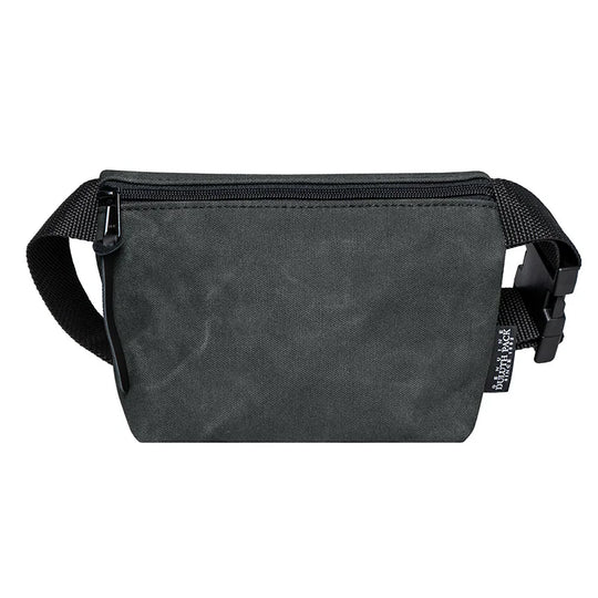 Mini Belt Bag in waxed grey canvas with black adjustable strap, designed by Duluth Pack for durable, hands-free carrying of essentials outdoors.