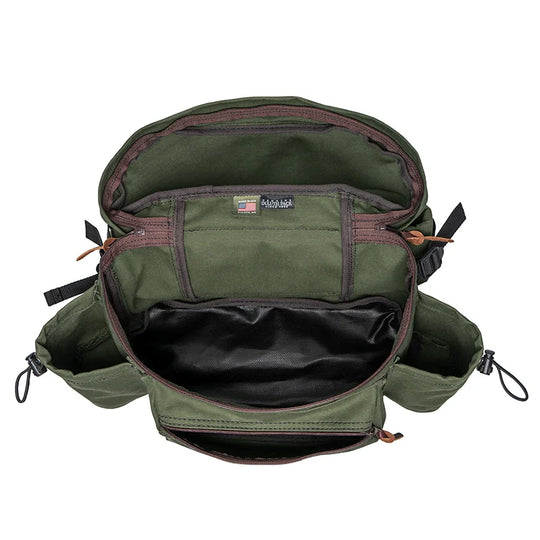 All Day Lumbar Pack in Olive Drab canvas with durable black waterproof lining, showcasing spacious interior compartments for organized outdoor use by Duluth Pack.