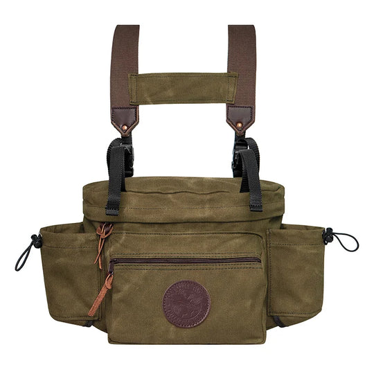 All Day Lumbar Pack in waxed olive drab canvas with removable straps, designed by Duluth Pack for rugged outdoor use and durable everyday carry.
